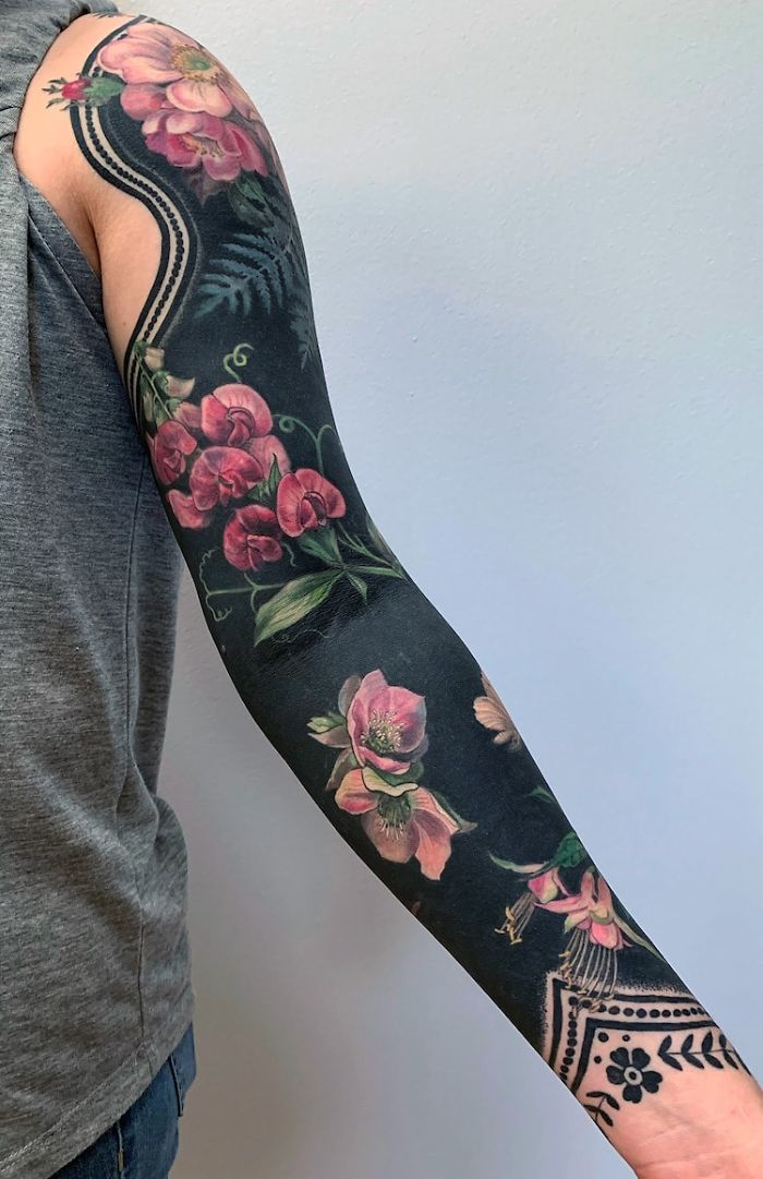 Artist Took The Blackout Tattoo Trend To The Next Level By Tattooing Renaissance-Inspired Blossoms On People's Limbs