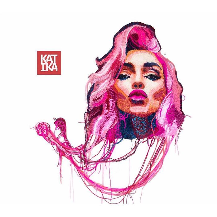 Crochet artist portrait featuring a vibrant pink-haired woman with detailed facial features and loose yarn strands.