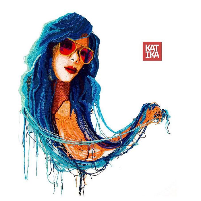 Crochet art portrait of a woman with blue hair and red sunglasses, showcasing detailed yarn work and vibrant colors.