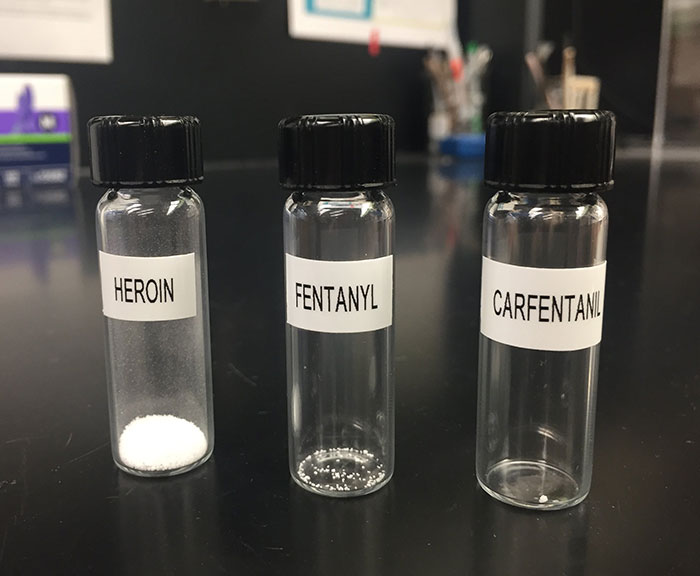 Vials Of Heroin, Fentanyl, And Carfentanil Side By Side, Each Containing A Lethal Dose Of The Drug