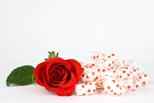 stockvault-red-rose-and-ribbons133794-5e464036007e8.jpg