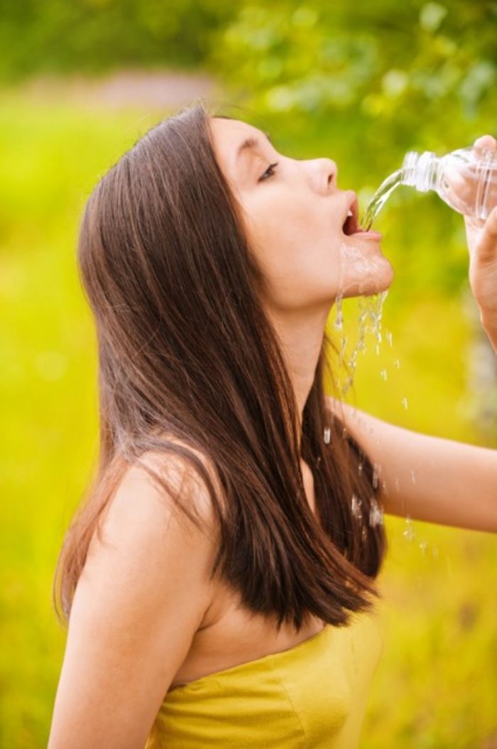 Women-Dont-Know-How-To-Drink-Water-Stock-Photos