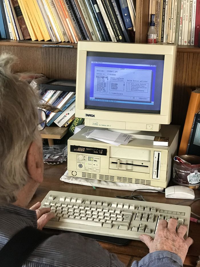 Grandpa Still Uses A Decades Old Computer That Still Runs DOS, Typing And Printing And Storing Things On Floppies