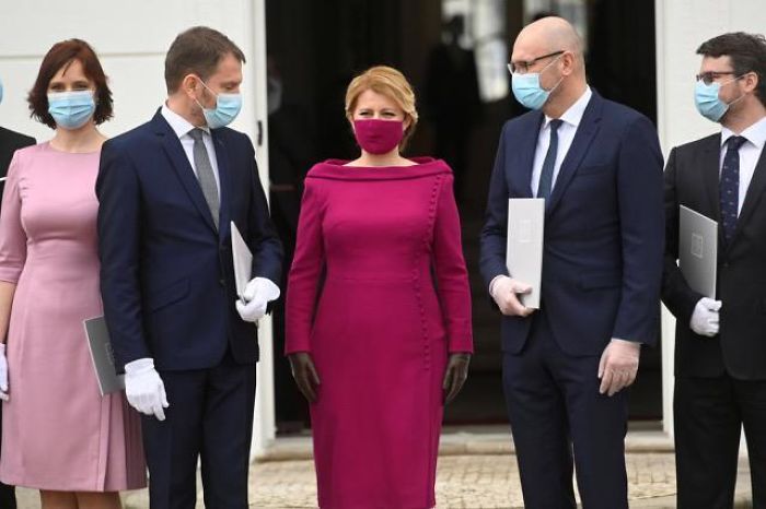 The President Of Slovakia Showing Up In Her Hand-Tailored, Matching Fabric Surgical Mask
