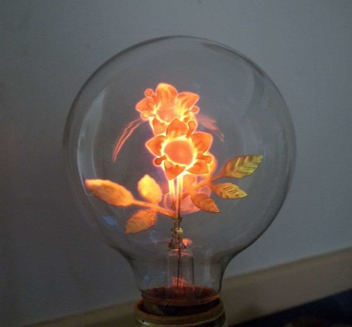 The Filament Of This Antique Light Bulb Is Shaped Like Flowers