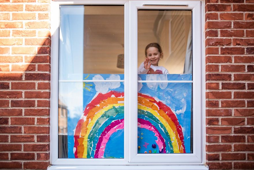 I'm Photographing Family Life "Through The Rainbow Windows" During Social Distancing