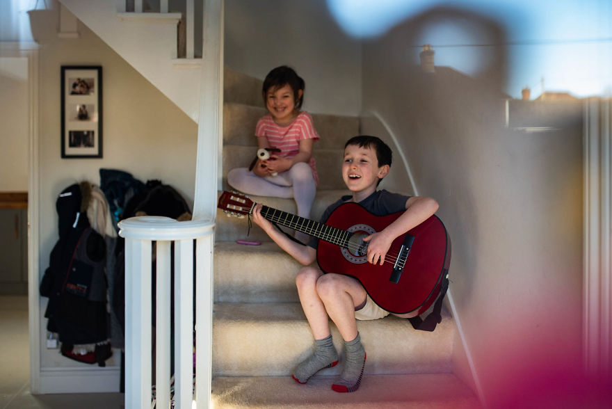 I'm Photographing Family Life "Through The Rainbow Windows" During Social Distancing