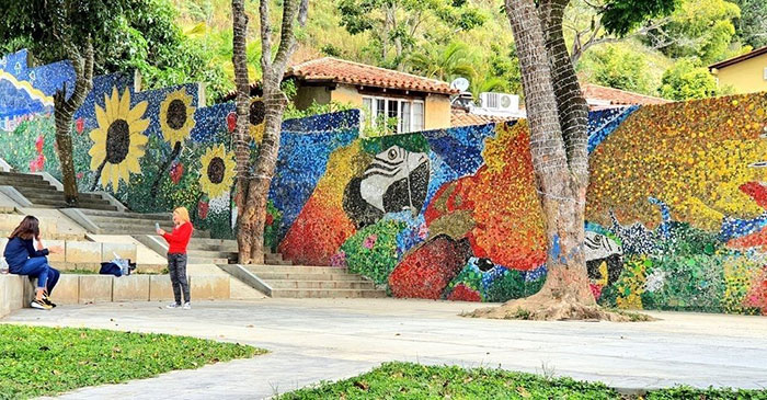 Artist Uses 200k Recycled Bottle Caps To Create Venezuela's First Eco-Mural