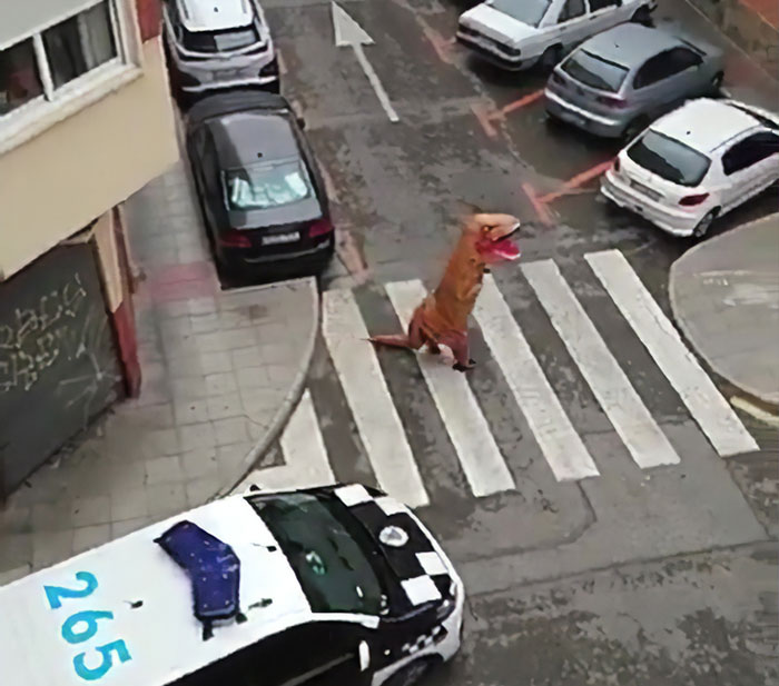 Police Caught A Man Outside In T-Rex Costume During Spain’s Coronavirus Lockdown