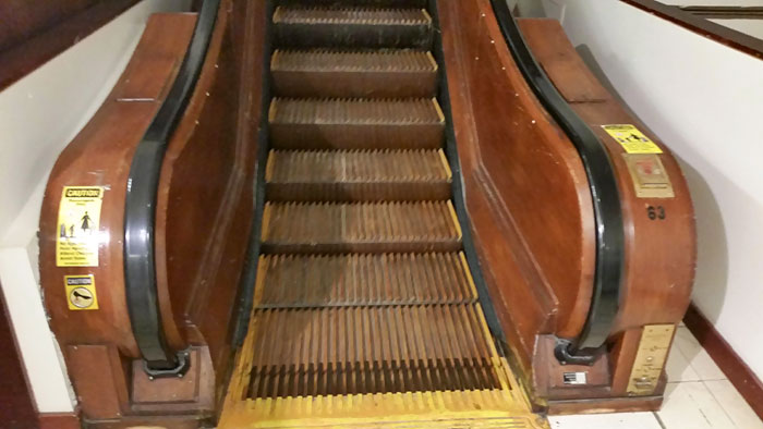 This Working Wooden Escalator In An Old Department Store. The Stairs Are Wood As Well