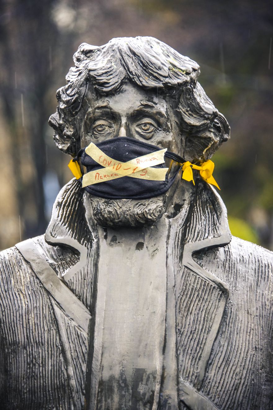 Bulgarian Artist Responds To The First Cases Of Coronavirus In His Country By Putting Masks On Statues In Sofia To Show How Insignificant It Is