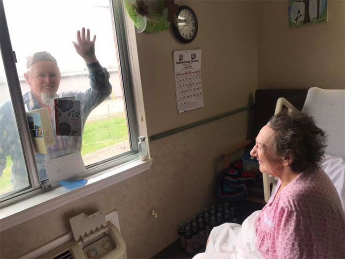 Covid-19 Can’t Keep True Love Apart... One Of Our Sweet Couples That Have Been Married For 54 Years, Visiting Through Her Room Window! So Precious!