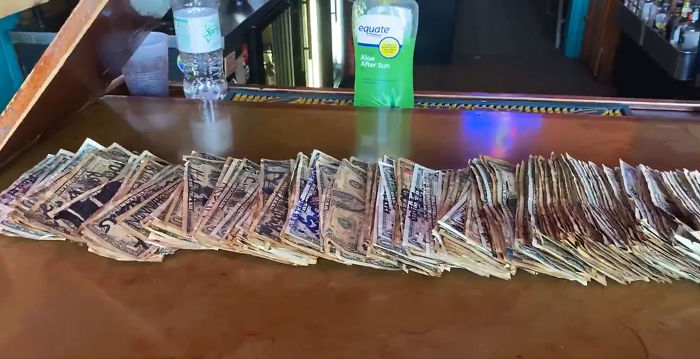 Bar Owner Removes $3,714 Worth Of Bills Stapled To The Walls To Pay Unemployed Staff