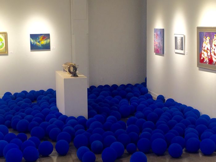Museum Exhibit Full Of Blue Balloons