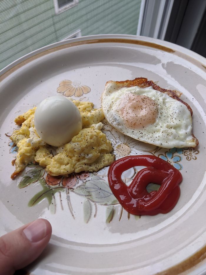 Hard Boiled Egg On A Bed Of Scrambled Egg With A Sunny Side Of Egg