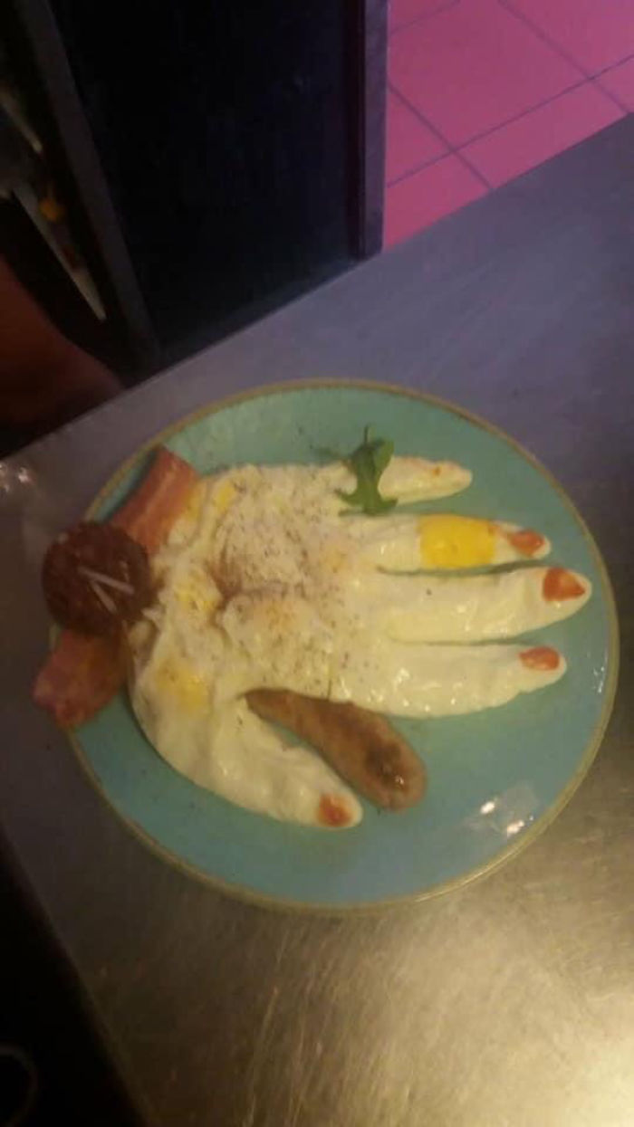 Eggs Poached In A Latex Glove With Ketchup Nails & A Sausage Watch