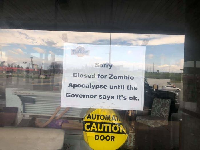 This Sign On A Furniture Store Window