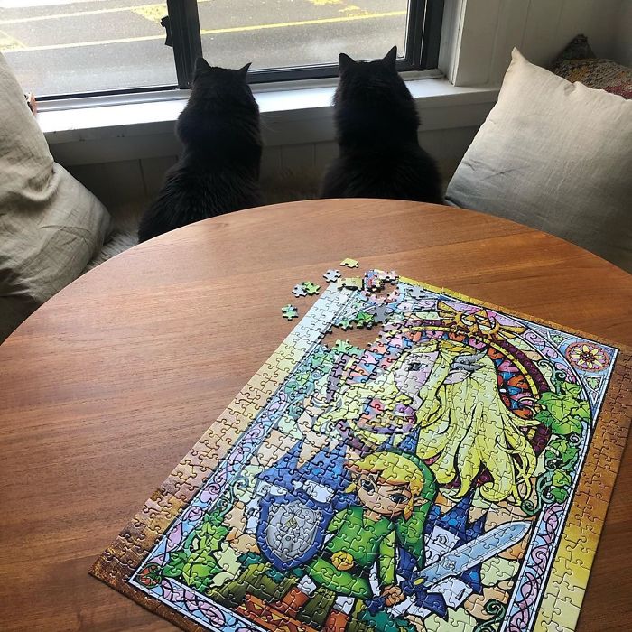 Apparently Even A Finished Puzzle Isn't Safe From Cats