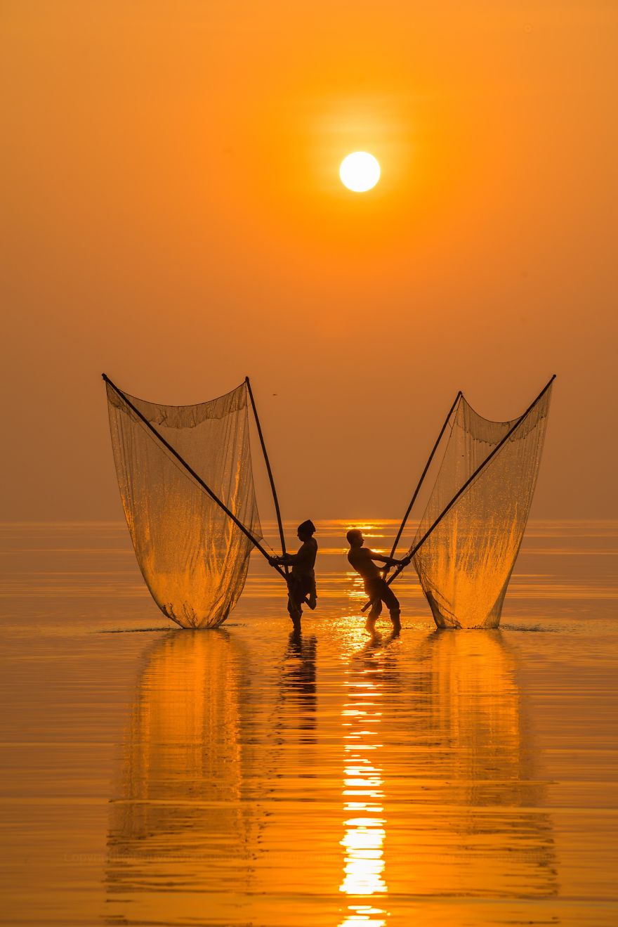 Fisherman Under The Dawn