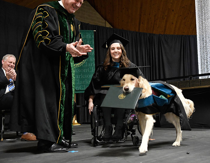 Service Dog Receives His Master's Degree In Occupational Therapy From Clarkson University After He Attends Every Class With His Owner