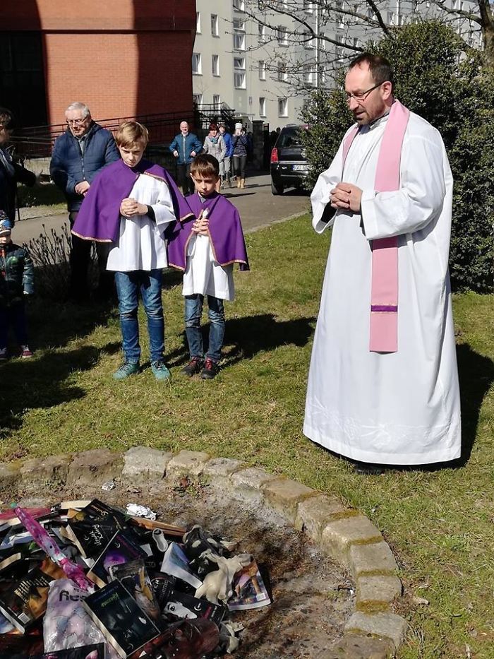 Polish Catholic Priest And Kids Burning Stuff Such As Harry Potter Books, Lord Of The Rings, Buddhist Figurines