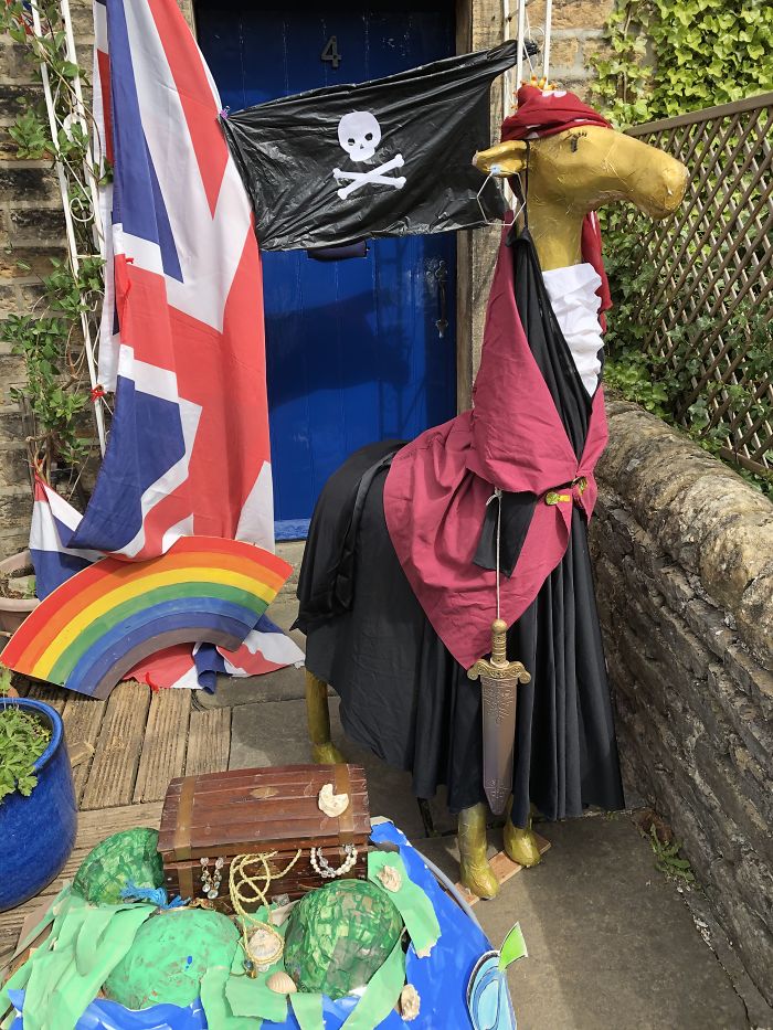 Gloria The Giraffe Dressed Up As A Pirate With Her Treasure Trove
