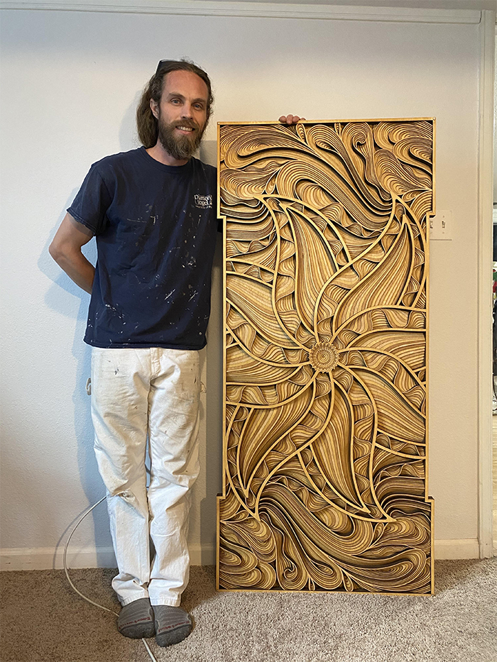 My quarantine project. Digital design, laser cut into 10 layers of plywood, stained brown. No name