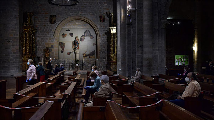 Pews Are Taped Off To Enforce Social Distancing At A Church In Spain