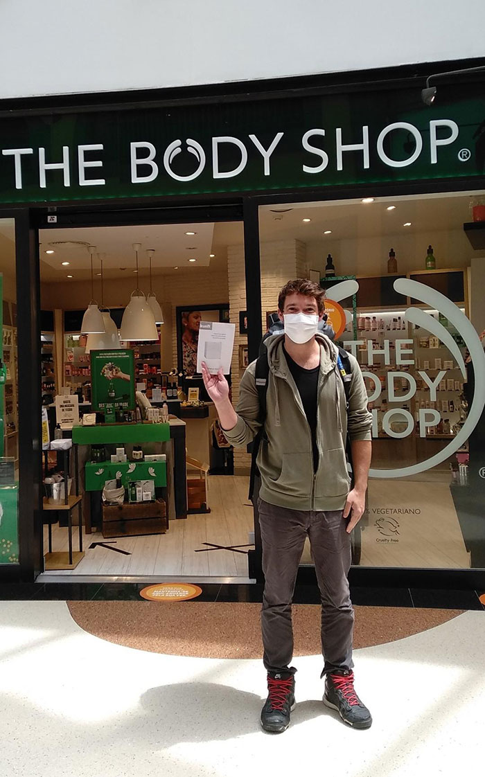 An Instruction Manual In Front Of The Body Shop