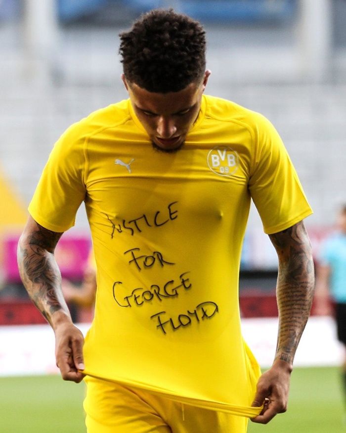 Jadon Sancho Reveals A 'Justice For George Floyd' Shirt After His Goal For Dortmund.
