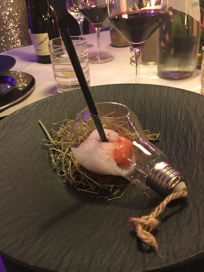 Sorbetto With Foam Served In A Lightbulb On A Bed Of Dried Grass