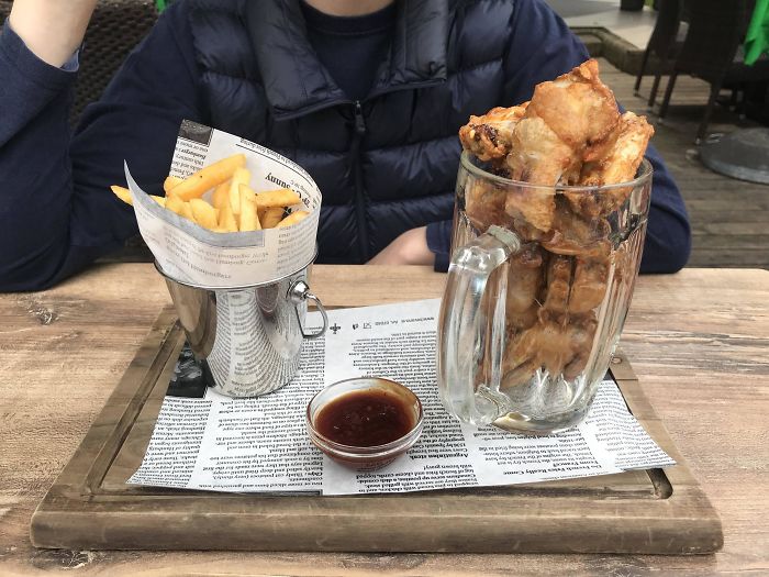 A Glass Of Wings With A Bucket Of Fries