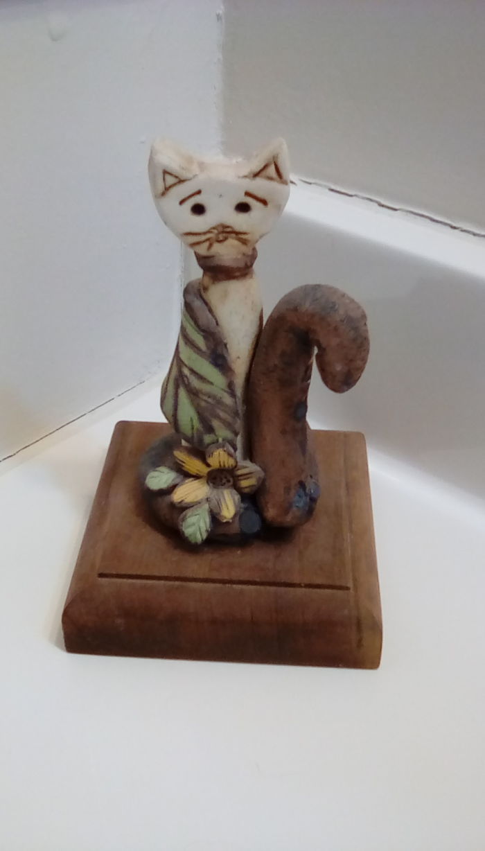 Sad Cat Statue With A Giant Turd For A Tail