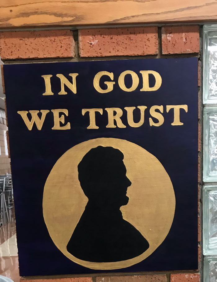 Kentucky School District Finds A Brilliant Loophole For The “In God We Trust” Law By Framing A One-Dollar Bill