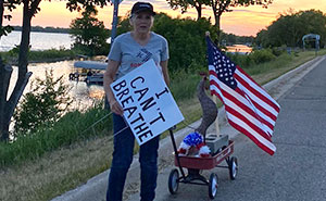 These 16 Pics Of Lone Protesters Are Going Viral To Show No Voice Is Too Small