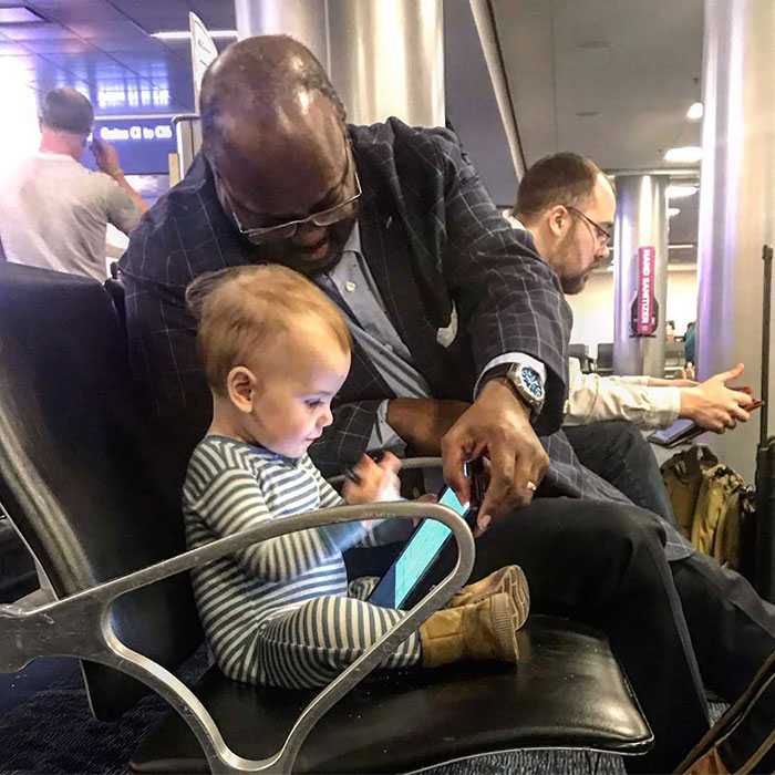 Toddler Bonding With A Stranger At A US Airport