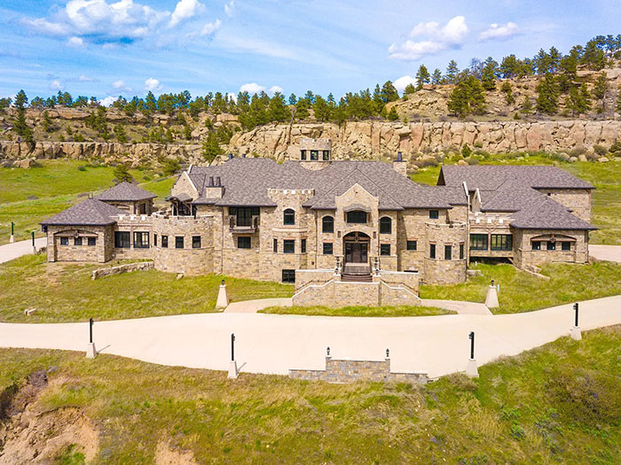 This Majestic 30,843-Square-Foot 'Castle' Sells For $13.95 Million And It Even Has A Fitness Center And Indoor Shooting Range