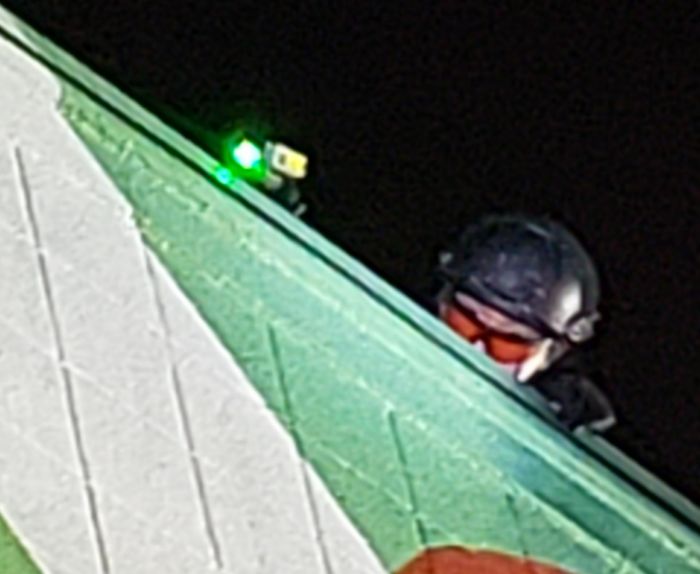 What Is This Scanner That A Rooftop Cop Had At A Protest? Seemed To Be Shining A Green Laser At Certain People In The Crowd