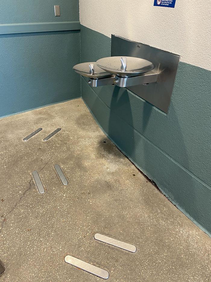 What Are The Purpose Of The Metal Plates On The Ground In Front Of Some Of The Water Fountains At Universal Studios Orlando?