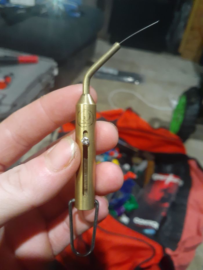Brass Object, Has A Screw That Slides Up The Side And Pushes A Wire Out The Top??? We're Stumped