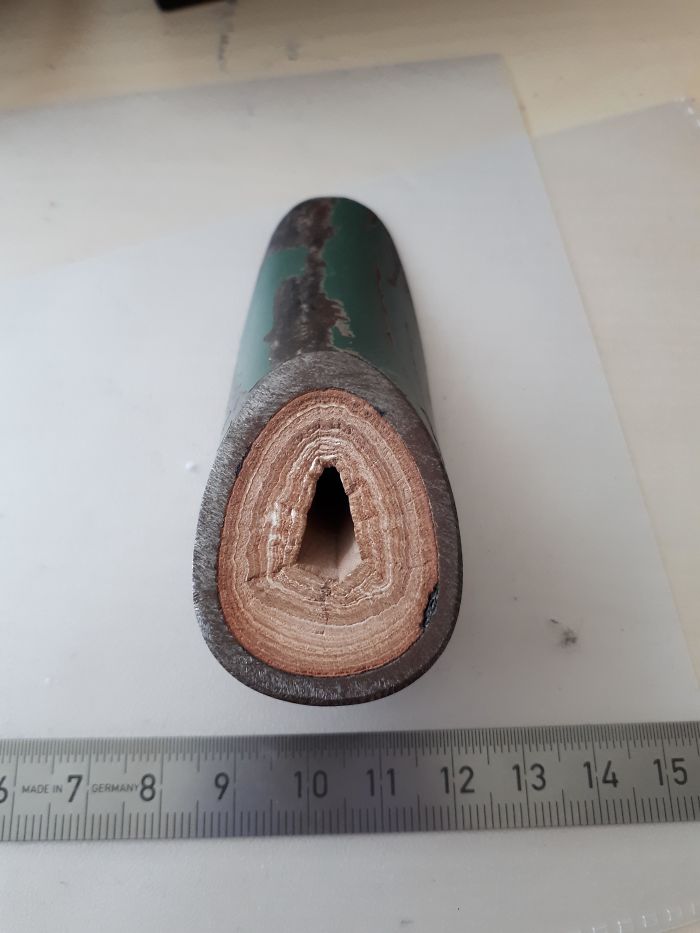 Crosscut Of An Old Waterpipe Showing The Layers Of Limescale Built Up Over Time
