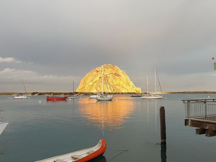 Morro Rock Looks Like A Pile Of Gold During Sunrise