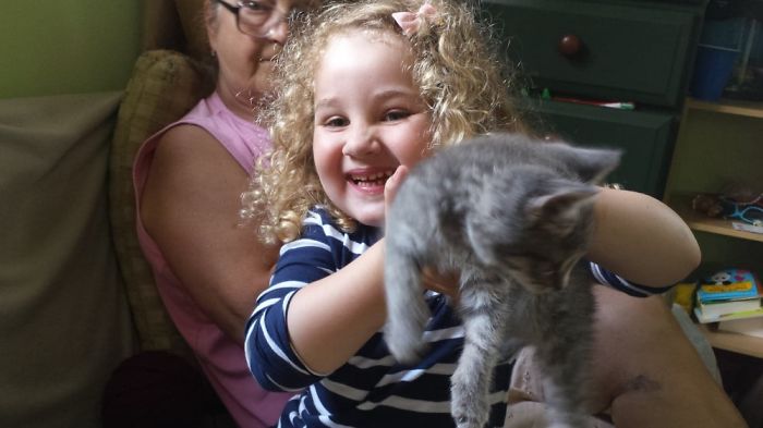 My Daughter With Her First Kitten