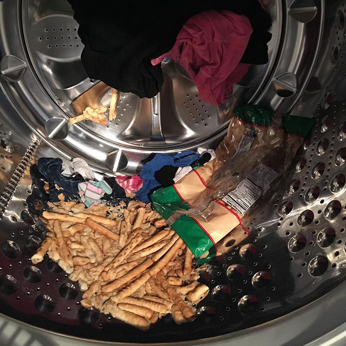 Really? Seriously This Is Inside Of My Washing Machine. How A Bag Of TJ's Pretzels Got Into My Hamper I Will Never Know