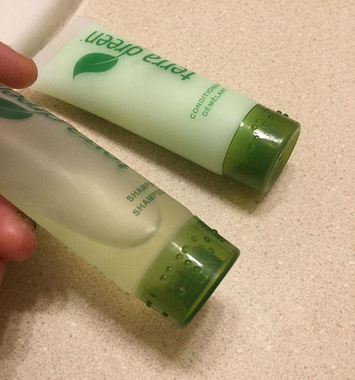 These Shampoo And Conditioner Bottles Have Braille On Them To Identify What They Are For The Blind/ Visually Impaired