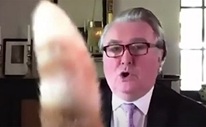 "I Apologize For My Cat’s Tail": Scottish MP Goes Viral After His Cat Photobombs A Zoom Meeting