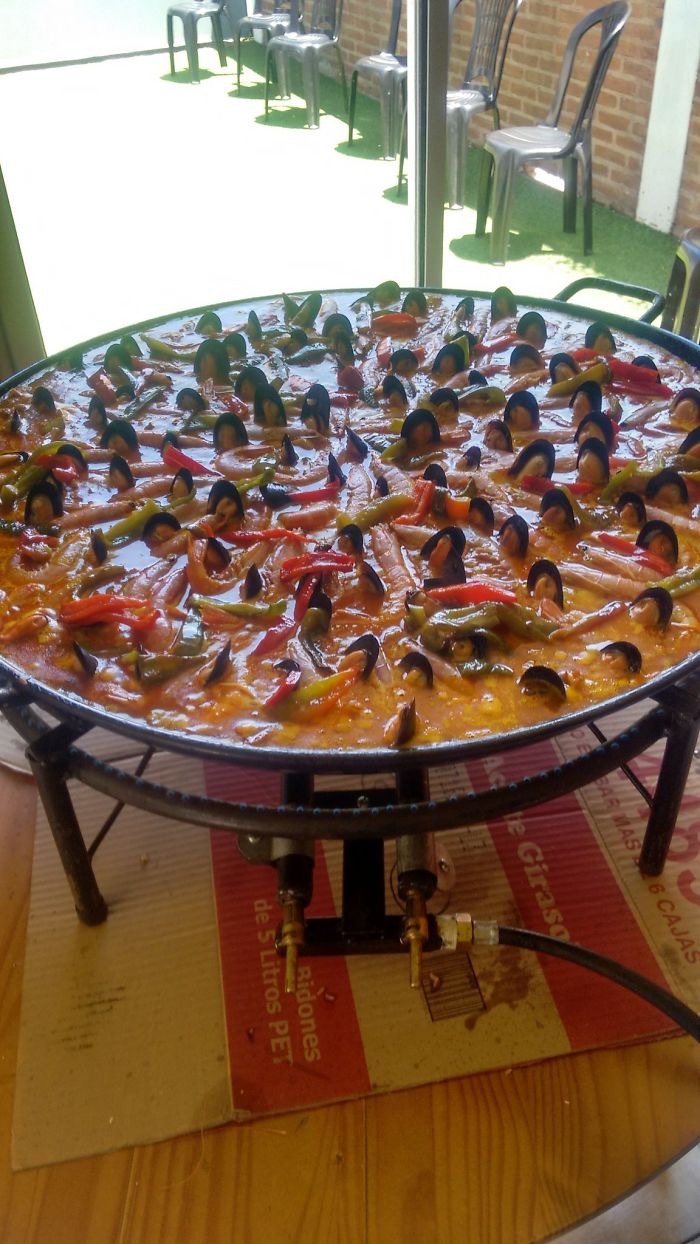 This Paella Looks Like A Bunch Of People In A Dirty Pool