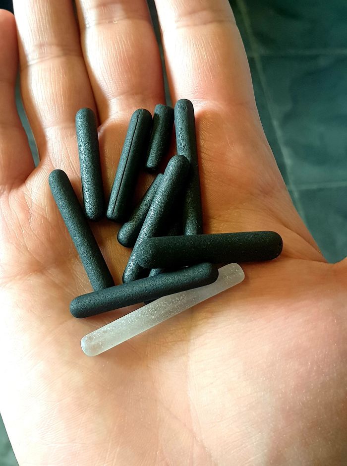 Found On The Shoreline Of A Beach In The Scottish Isles. They Were Scattered, Not In One Area. Feel Like Glass, One Clear And The Rest Black. The One That Has A Line Has Equal Lines All The Way Around