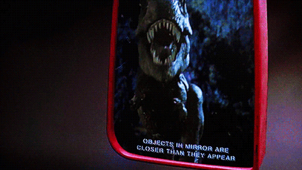 In Jurassic Park When During The T-Rex Chase The Mirror Of The Jeep Says "Objects In Mirror Are Closer Than They Appear"
