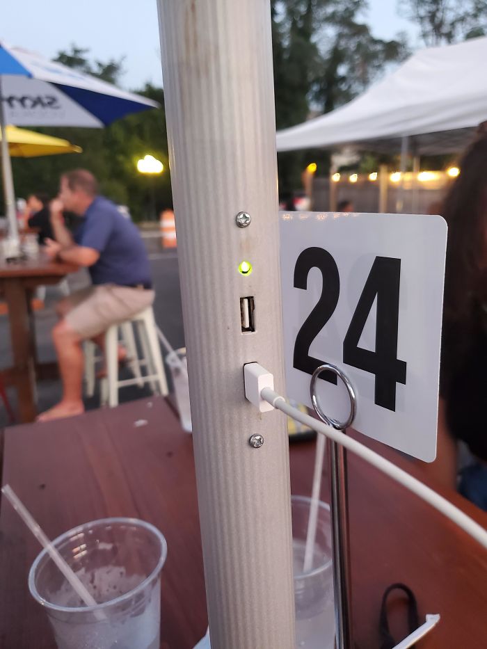 This Restaurant I Went To Has Solar-Powered Phone Chargers Built Into The Umbrellas